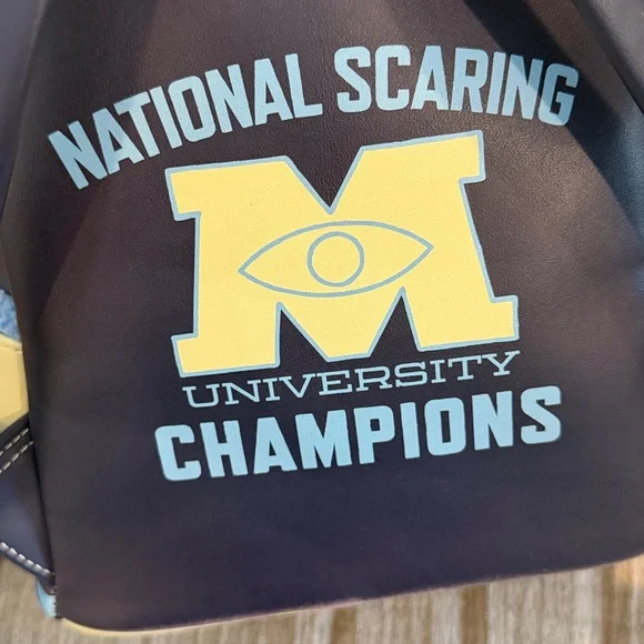 Disney Monsters University varsity jacket Navy and Cream Backpack 10 x 8 - Picture 7 of 10